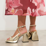 MIM Sandalia de tacón Sunne Dorado